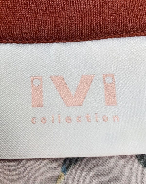 Etikett mit ivi Logo-Stick